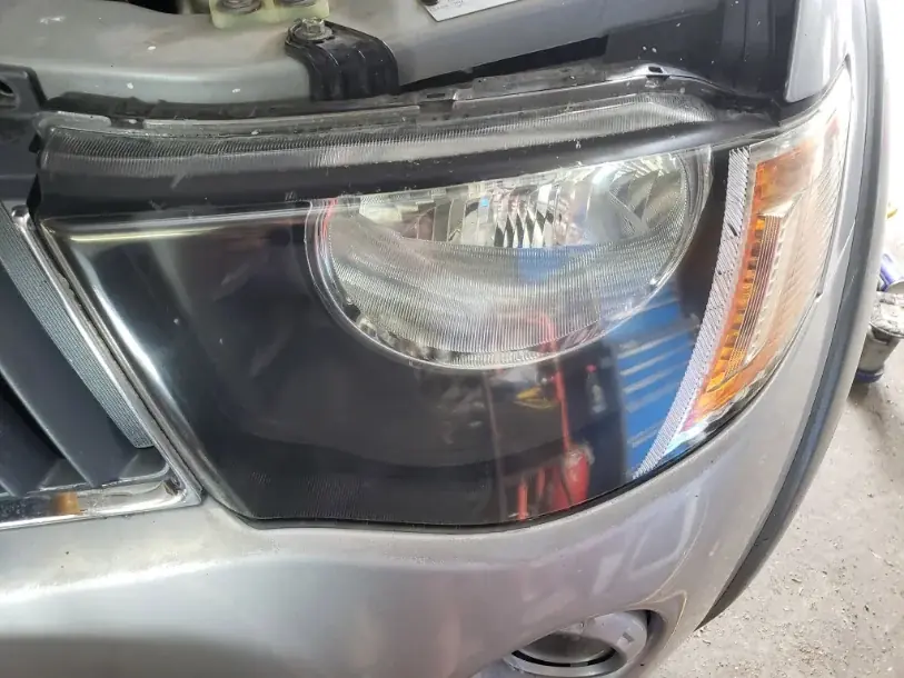 Clear vehicle headlight after repair work